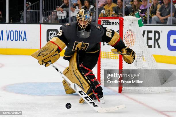 Marc-Andre Fleury of the Vegas Golden Knights turns the puck aside against the Montreal Canadiens during the third period in Game Five of the Stanley...