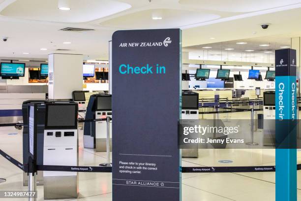 An empty Air New Zealand check in is seen at Sydney International airport on June 23, 2021 in Sydney, Australia. Sydney records 16 new locally...