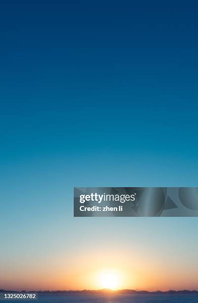 the gradient of the sky at sunrise - watercolor sunrise stock pictures, royalty-free photos & images