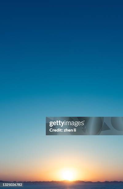 the gradient of the sky at sunrise - early morning sky stock pictures, royalty-free photos & images