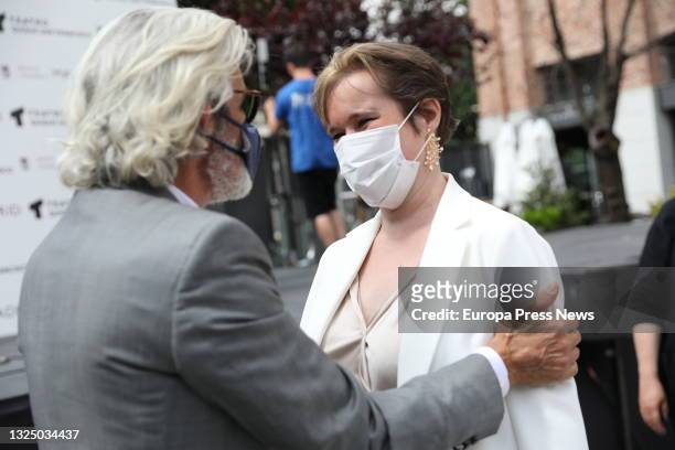 Actor Micky Molina talks with the girlfriend of actor Quique San Francisco during the unveiling of the new name of the Teatro Galileo, on June 23 in...