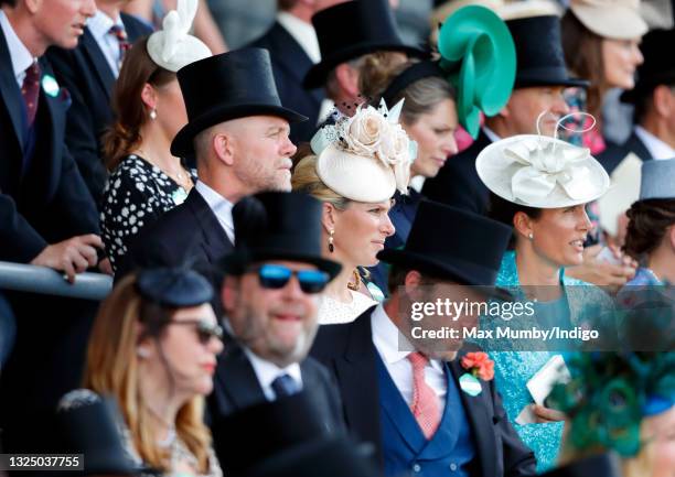 Mike Tindall and Zara Tindall watch the racing as they attend day 1 of Royal Ascot at Ascot Racecourse on June 15, 2021 in Ascot, England.