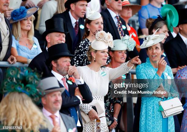 Mike Tindall, Zara Tindall and Dolly Maude watch the racing as they attend day 1 of Royal Ascot at Ascot Racecourse on June 15, 2021 in Ascot,...