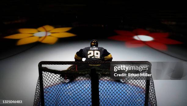 Flowers are projected on the ice as Marc-Andre Fleury of the Vegas Golden Knights is introduced before Game Five of the Stanley Cup Semifinals during...