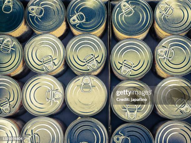 reserve cans - producto enlatado fotografías e imágenes de stock