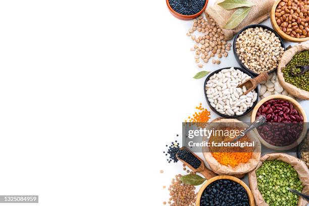 dried legumes and beans border on white background - black eyed peas food stock pictures, royalty-free photos & images