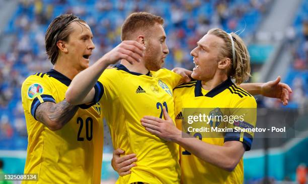 Emil Forsberg celebrates with teammates Dejan Kulusevski and Kristoffer Olsson after scoring their side's second goal during the UEFA Euro 2020...