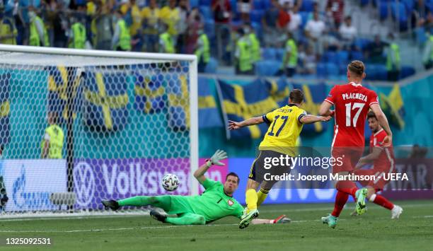 Viktor Claesson of Sweden scores their side's third goal past Wojciech Szczesny of Poland during the UEFA Euro 2020 Championship Group E match...