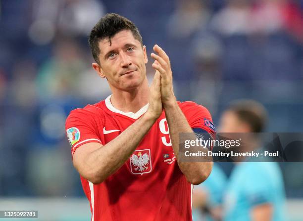 Robert Lewandowski of Poland acknowledges the Poland fans following their side's defeat in the UEFA Euro 2020 Championship Group E match between...