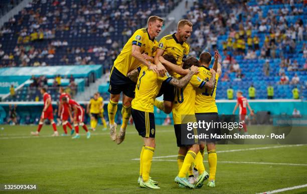 Viktor Claesson of Sweden celebrates with teammates after scoring their side's third goal during the UEFA Euro 2020 Championship Group E match...