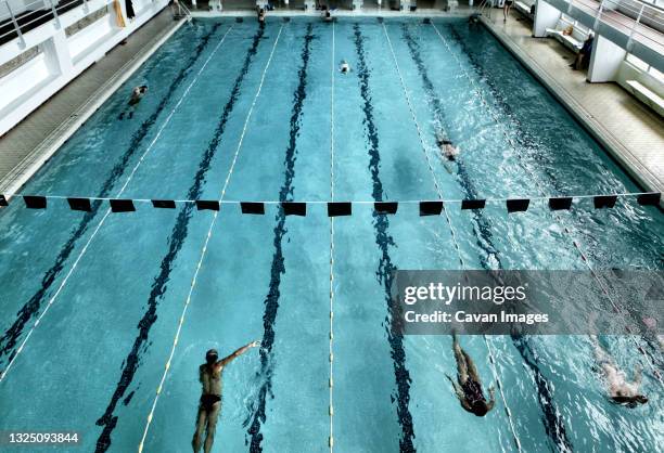 the cercle des nageurs de marseille is part of the french swimming history, one of the world's best swimming team - public pool stock pictures, royalty-free photos & images