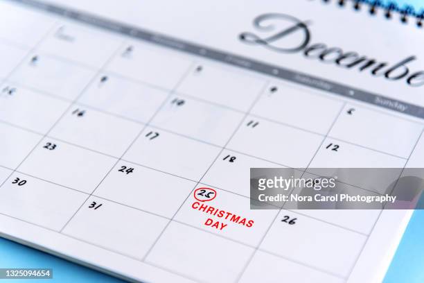 december 25th christmas day - day of the week stockfoto's en -beelden