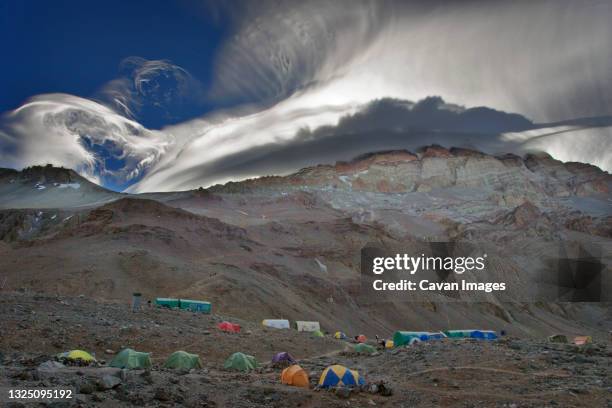 spectacular clouds on aconcagua, argentina - mount aconcagua stock pictures, royalty-free photos & images