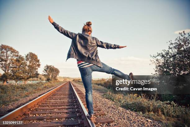 659 Balancing On Railroad Tracks Stock Photos, High-Res Pictures, and ...