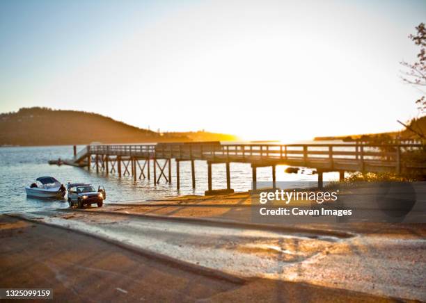 boat launch - vancouver sunset stock pictures, royalty-free photos & images