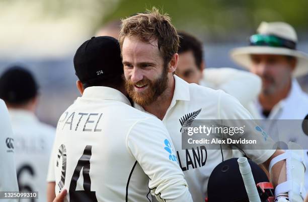 Kane Williamson of New Zealand celebrates with Ajaz Patel after the Reserve Day of the ICC World Test Championship Final between India and New...