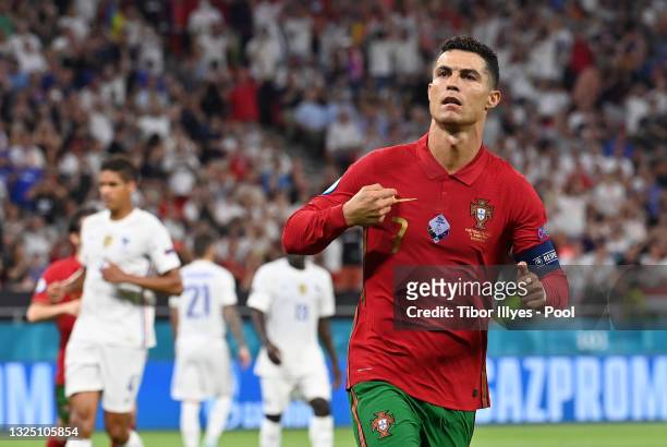 Cristiano Ronaldo of Portugal celebrates after scoring their side's first goal during the UEFA Euro 2020 Championship Group F match between Portugal...