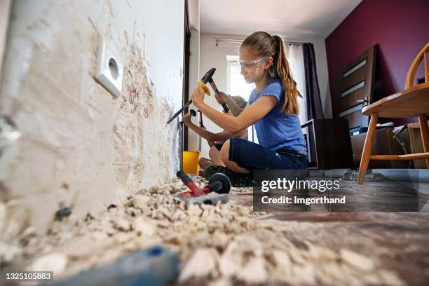 kids helping in home renovation - demolition stock pictures, royalty-free photos & images