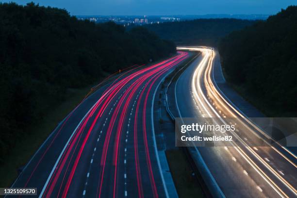 traffic trails over the m1 motorway - west yorkshire stock pictures, royalty-free photos & images