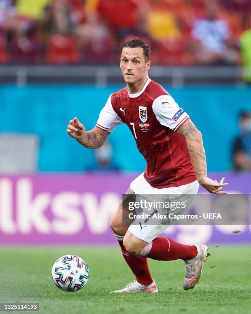 Marko Arnautovic of Austria runs with the ball during the UEFA Euro 2020 Championship Group C match between Ukraine and Austria at National Arena on...