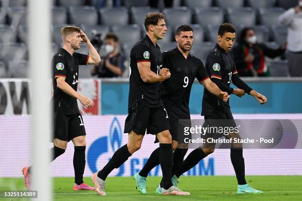 Leon Goretzka of Germany celebrates with Kevin Volland and team mates after scoring their side's second goal during the UEFA Euro 2020 Championship...