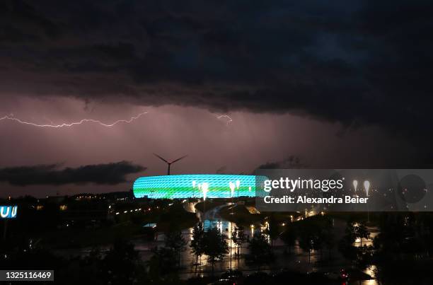 Lightning is pictured during a thunderstorm over Allianz Arena soccer stadium during the Euro 2020 Group F match between Germany and Hungary on June...