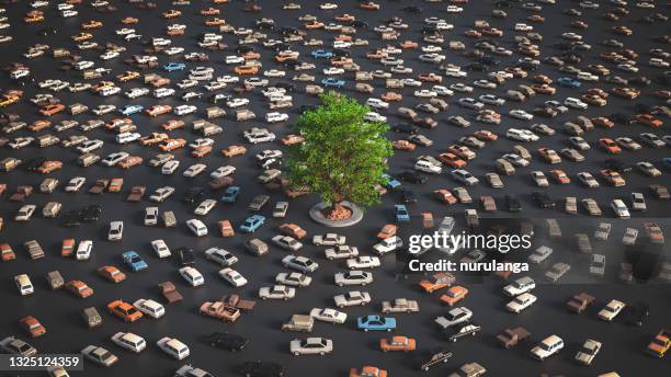 tree vs traffic, environment concept - car pollution stock pictures, royalty-free photos & images
