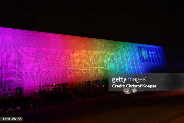 General view of the Merkur-Spiel Arena illuminated in rainbow colours on June 23, 2021 in Duesseldorf, Germany. The rainbow displays coincide with...