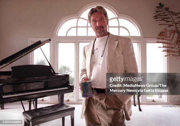 John McAfee is photographed in his Laselva Beach home on January 24, 2001. McAfee Associates, founded by John, had extremely colorful beginnings -...