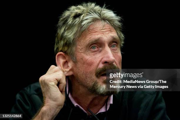 John McAfee listens to a question at the "Fireside Chat with John McAfee" talk during the C2SV Technology Conference + Music Festival at the McEnery...