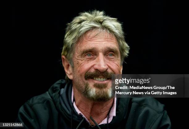 John McAfee reacts to a question at the "Fireside Chat with John McAfee" talk during the C2SV Technology Conference + Music Festival at the McEnery...