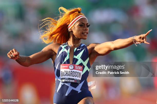 Sha'Carri Richardson runs and celebrates in the Women's 100 Meter semifinal on day 2 of the 2020 U.S. Olympic Track & Field Team Trials at Hayward...