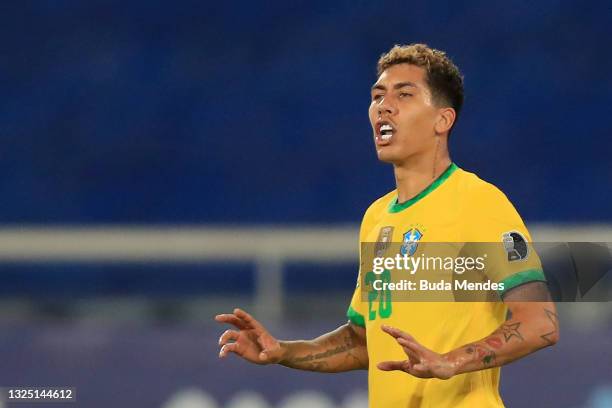 Roberto Firmino of Brazil reacts after scoring the first goal of his team during a Group B match between Brazil and Colombia as part of Copa America...