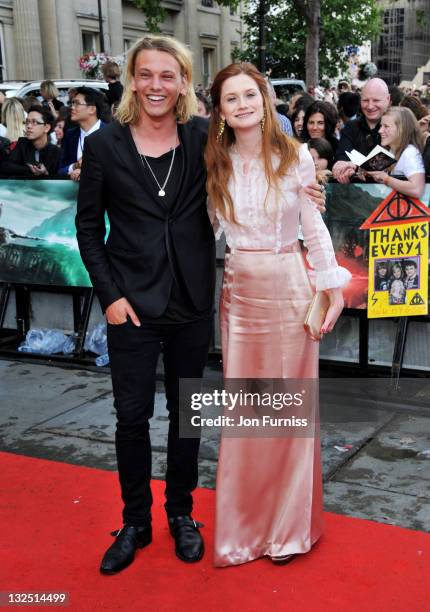 Jamie Campbell Bower and Bonnie Wright attend the ""Harry Potter And The Deathly Hallows Part 2"" world premiere at Trafalgar Square on July 7, 2011...