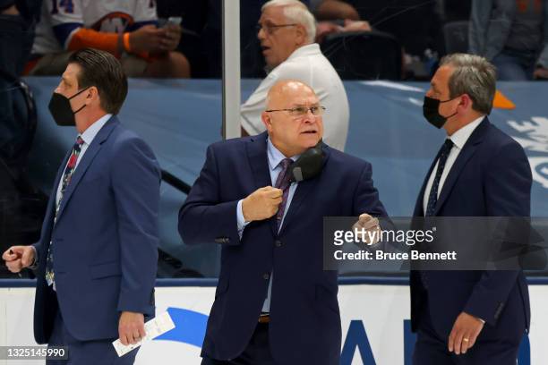 Head coach Barry Trotz of the New York Islanders reacts as he heads to the locker room following the second period against the Tampa Bay Lightning in...