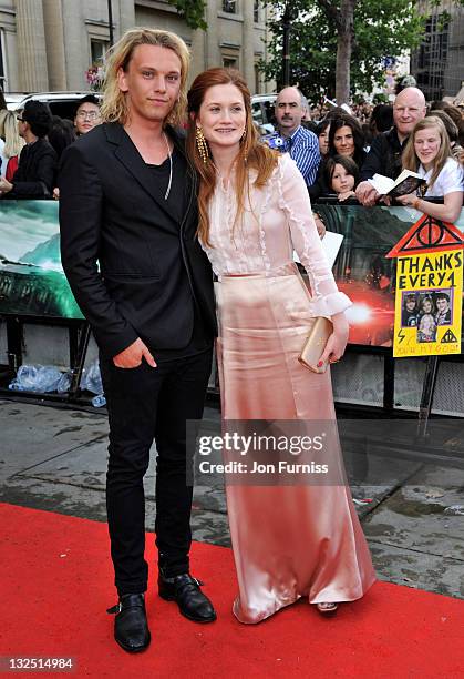 Jamie Campbell Bower and Bonnie Wright attend the ""Harry Potter And The Deathly Hallows Part 2"" world premiere at Trafalgar Square on July 7, 2011...