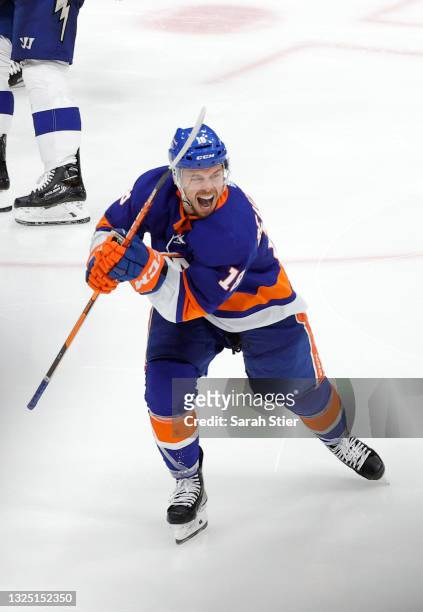 Anthony Beauvillier of the New York Islanders celebrates after scoring the game-winning goal during the first overtime period against the Tampa Bay...