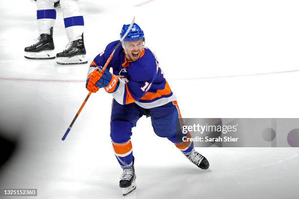 Anthony Beauvillier of the New York Islanders celebrates after scoring the game-winning goal during the first overtime period against the Tampa Bay...