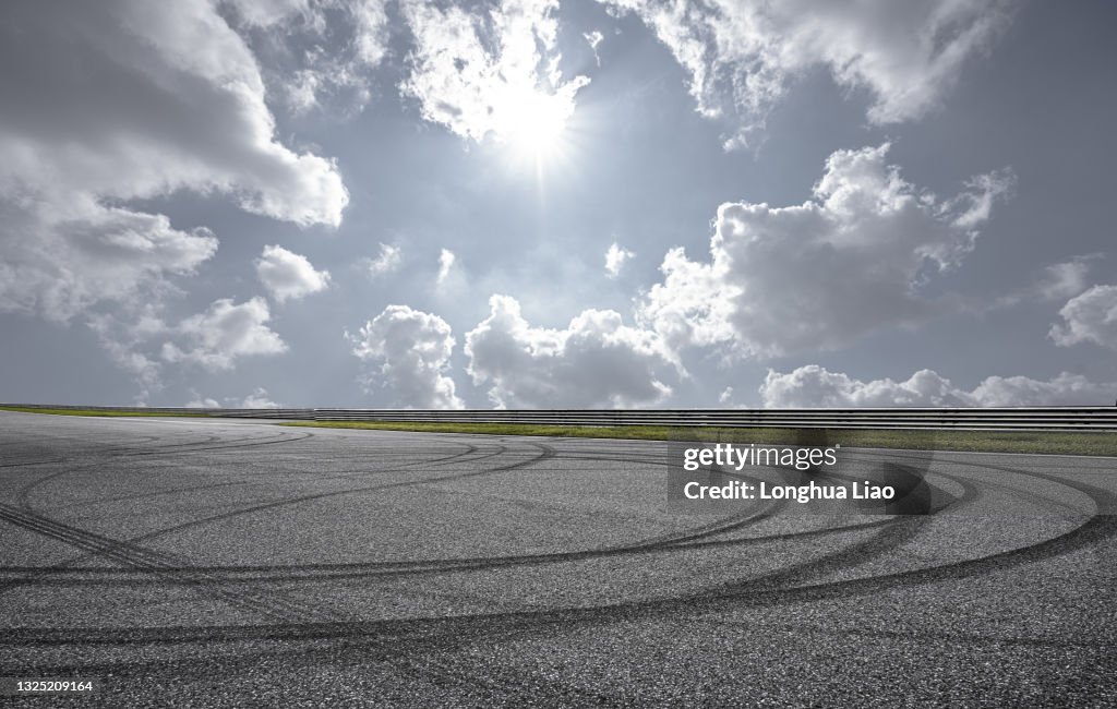 A road surface with tire tracks
