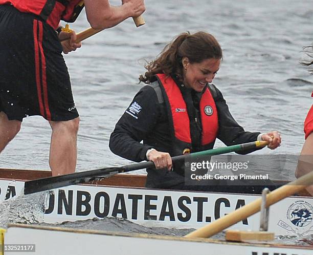 Catherine, Duchess of Cambridge rows in a dragon boat across Dalvay lake on July 4, 2011 in Charlottetown, Canada.