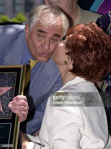 Actress Marion Ross gives dierctor Garry Marshall a kiss after she received a star on the Hollywood Walk of Fame July 12, 2001 in Hollywood, CA. Ross...