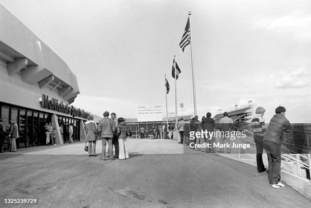Fans await an NBA basketball game between the Denver Nuggets and Boston Celtics on February 27, 1977 in lower downtown Denver, Colorado. The view is...
