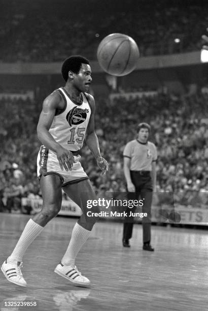 Denver Nuggets guard Jim Price throws a pass to a teammate during an NBA basketball game against the Boston Celtics at McNichols Arena on February...