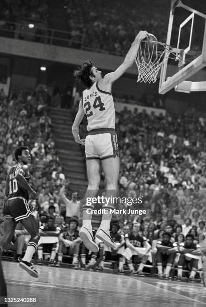 Denver Nuggets forward Bobby Jones dunks the basketball during an NBA basketball game against the Boston Celtics at McNichols Arena on February 27,...