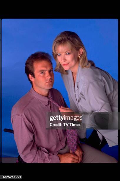 Actors Peter Amory and Claire King in character as Chris and Kim Tate in television soap Emmerdale, circa 1996.