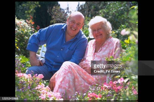 Actors John Savident and Elizabeth Bradley, known for their roles as Fred Elliott and Maud Grimes in television soap Coronation Street, circa 1998.