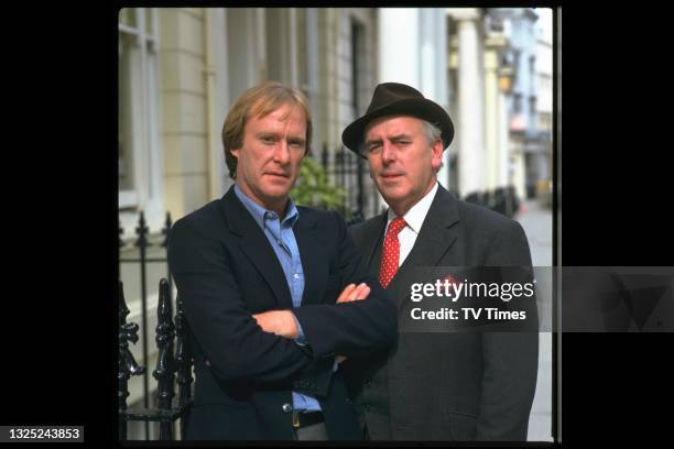 Actors George Cole and Dennis Waterman in character as Arthur Daley and Terry McCann on the set of comedy drama series Minder, circa 1984.