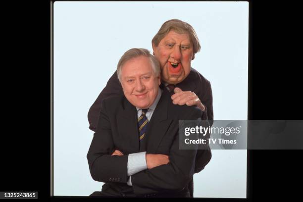 Labour MP Roy Hattersley posed with the puppet likeness of himself from political satire Spitting Image, circa 1987.