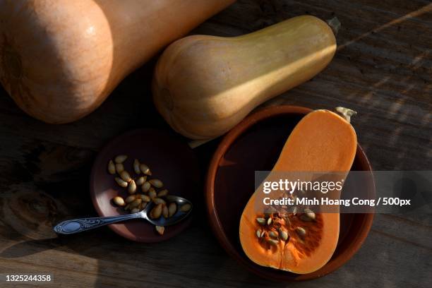 butternut squash cucurbita moschata on a table,paris,france - butternut squash stock pictures, royalty-free photos & images
