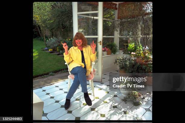 Actress Nerys Hughes photographed at home, circa June 1996.
